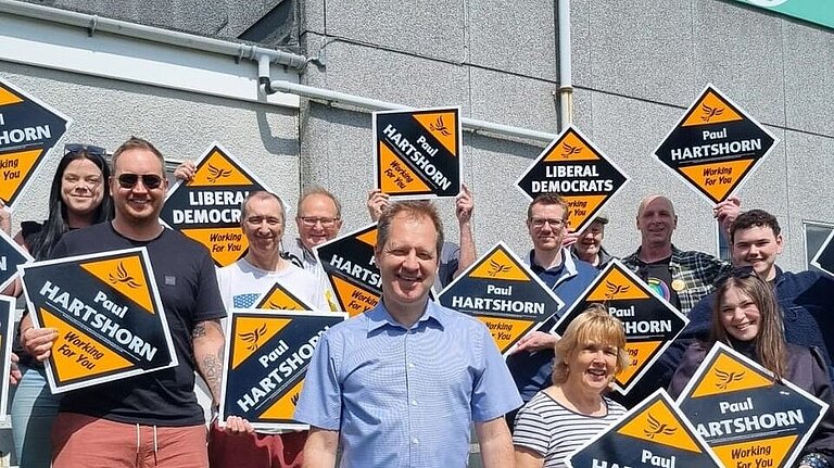 picture of members of South Leicestershire Lib Dems all holding diamonds and smiling